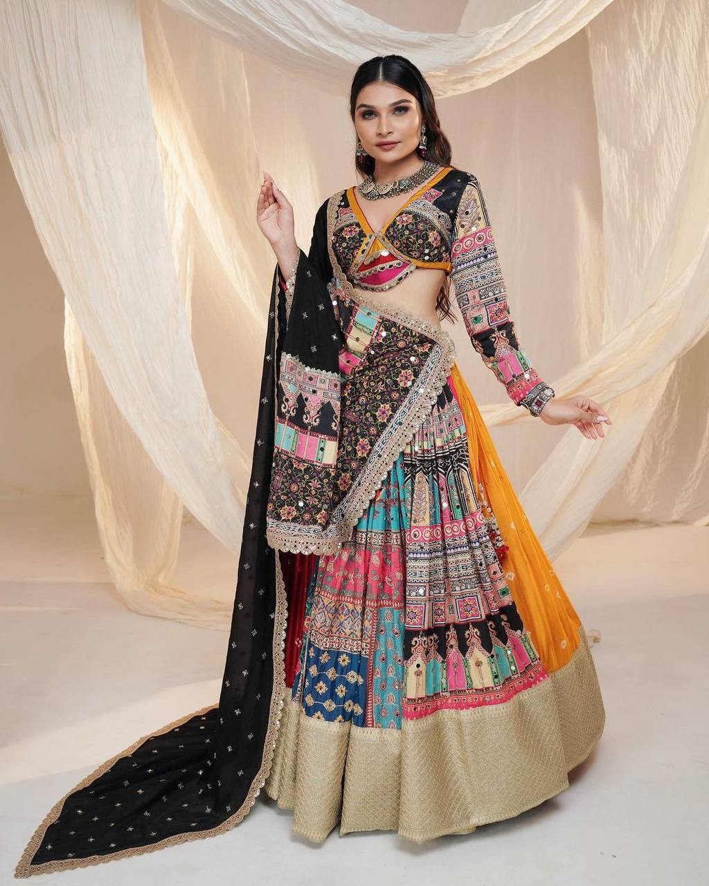 BEAUTIFUL LEHENGA CHOLI WITH CANVAS PATTA BORDER