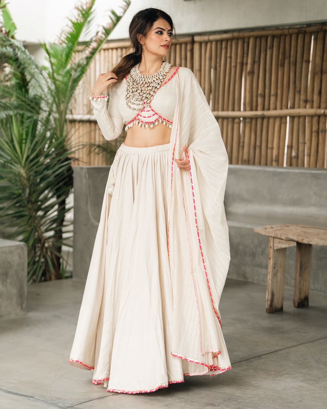 Meraki white lehenga set with Subtle Pink Highlights