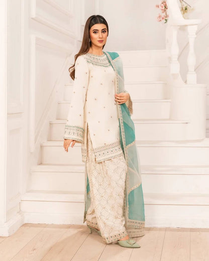 Naira Ivory Mint Embroidered Farshi Palazzo Suit